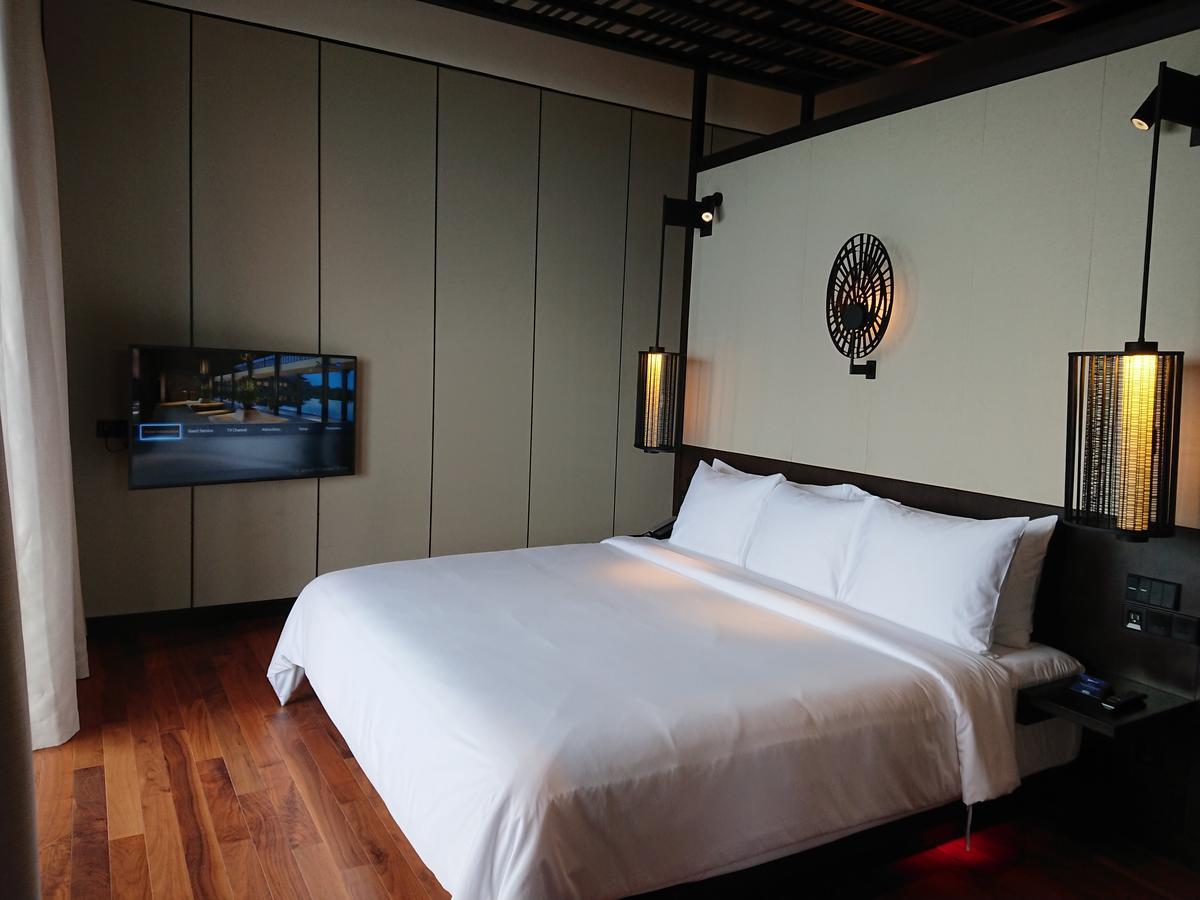 Hotel Radisson Blu Bali Uluwatu Esterno foto A bedroom at the hotel